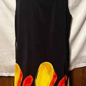 Navy 2 side split dress with orange, yellow, gold, green and light blue swirls.